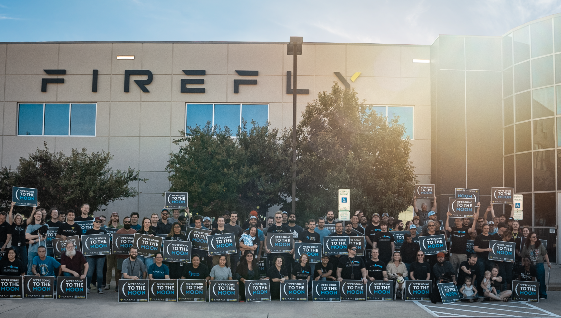 Firefly Team Outside Spacecraft Facility